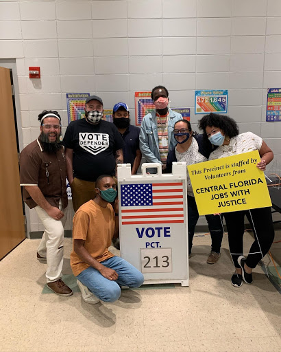 Group in Florida with Vote sign