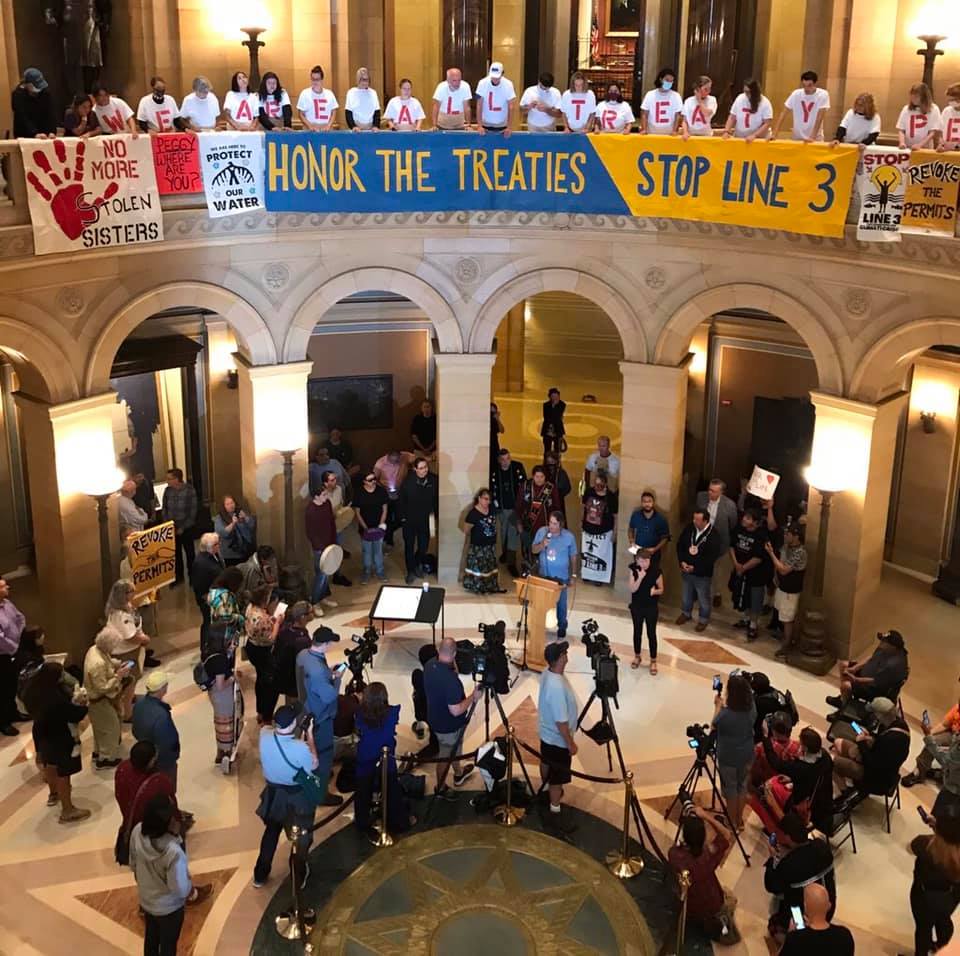 People in Minnesota with signs Honor the Treaties Stop Line 3