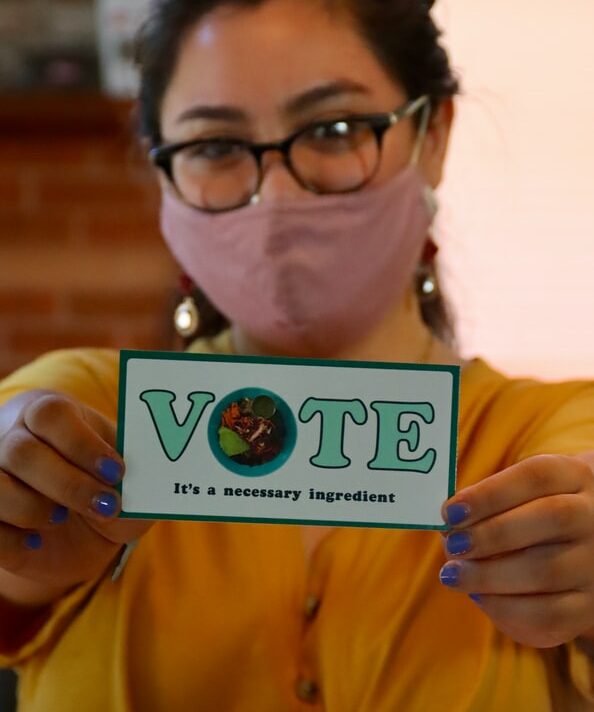 woman with Vote sign