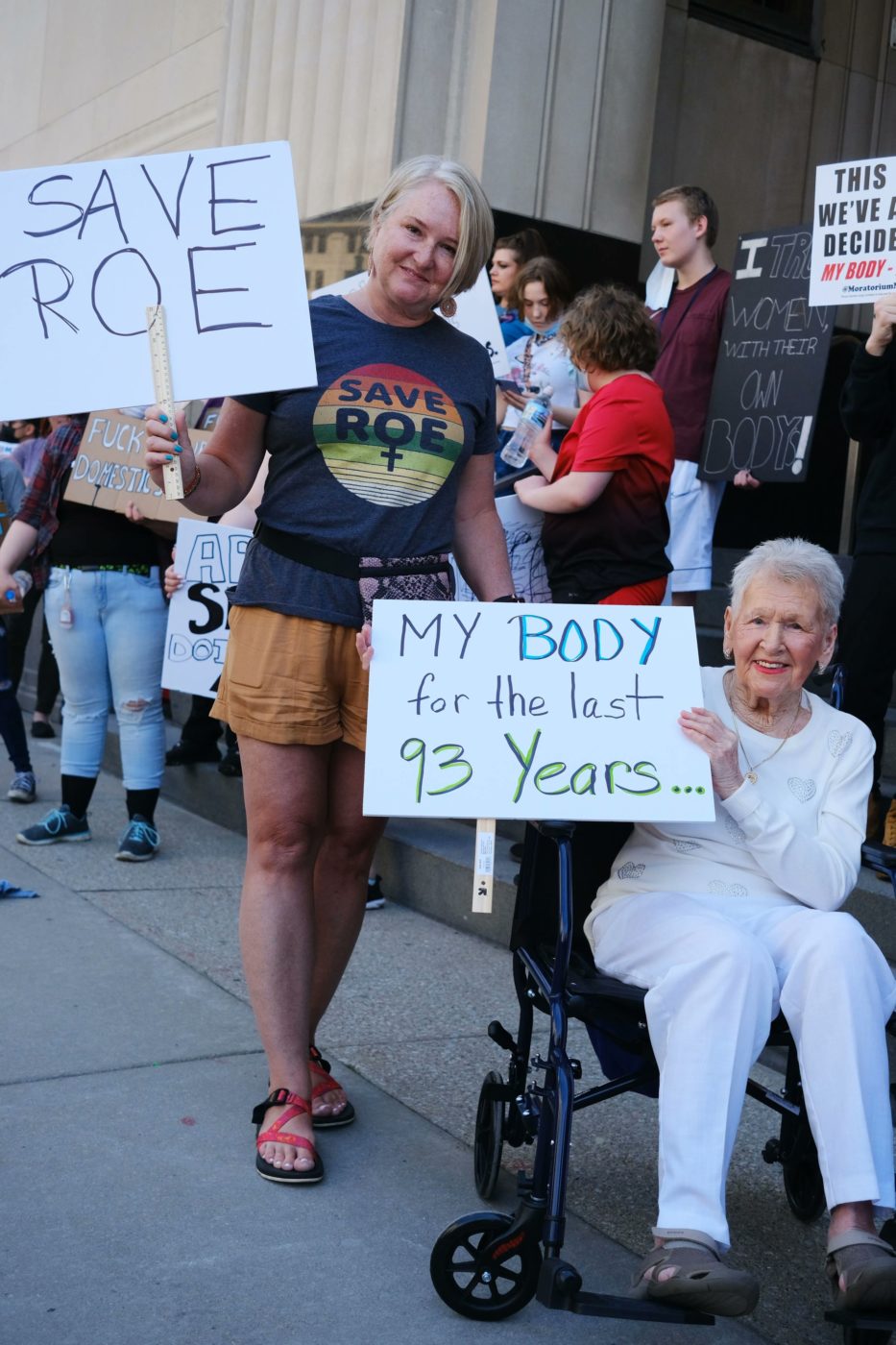 women holding signs