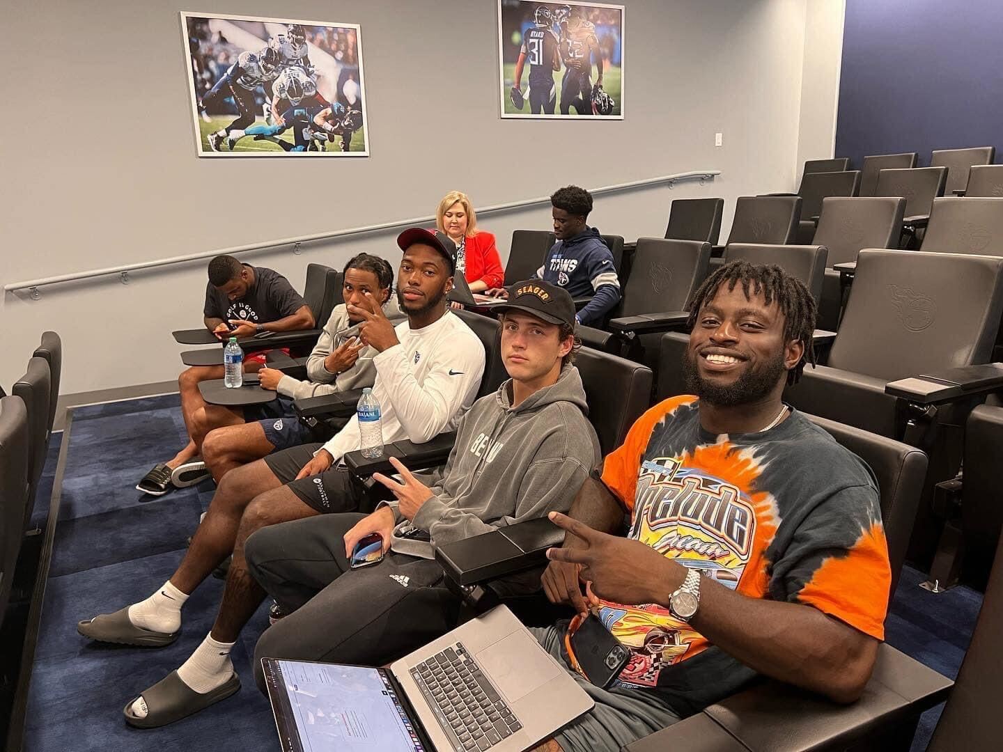 Members of the Tennessee Titans at a text bank with CivicTN for National Voter Registration Day. (Image Credit: the Titans Community)