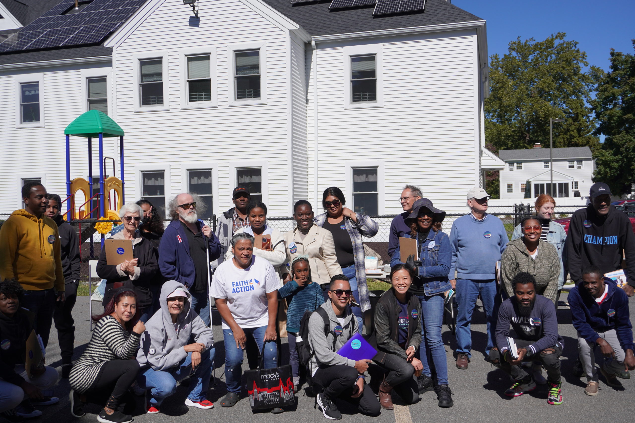 Volunteers with Massachusetts Voter Table and their partners pose before canvassing. Image credit: Massachusetts Voter Table