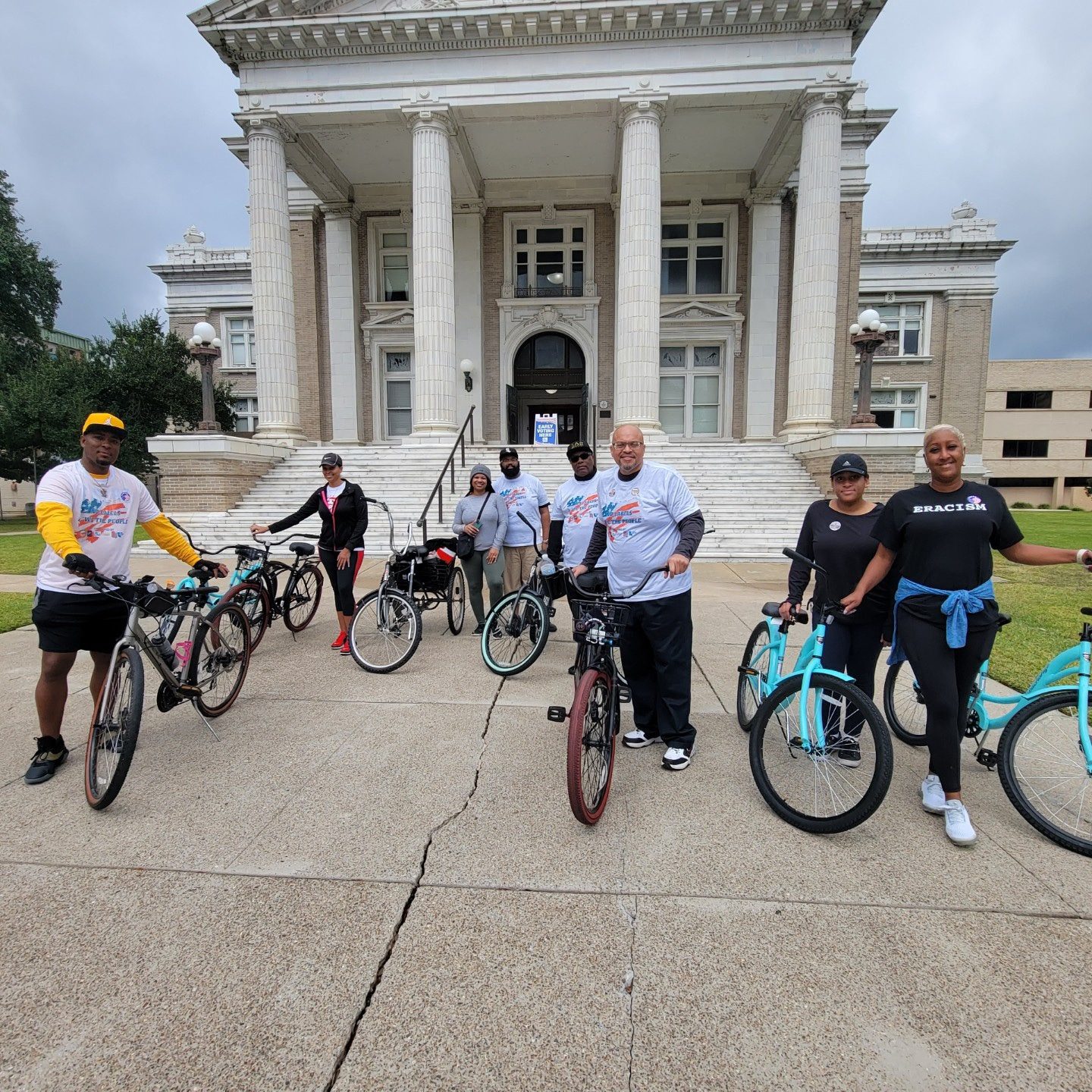 Group of people on bicycles.