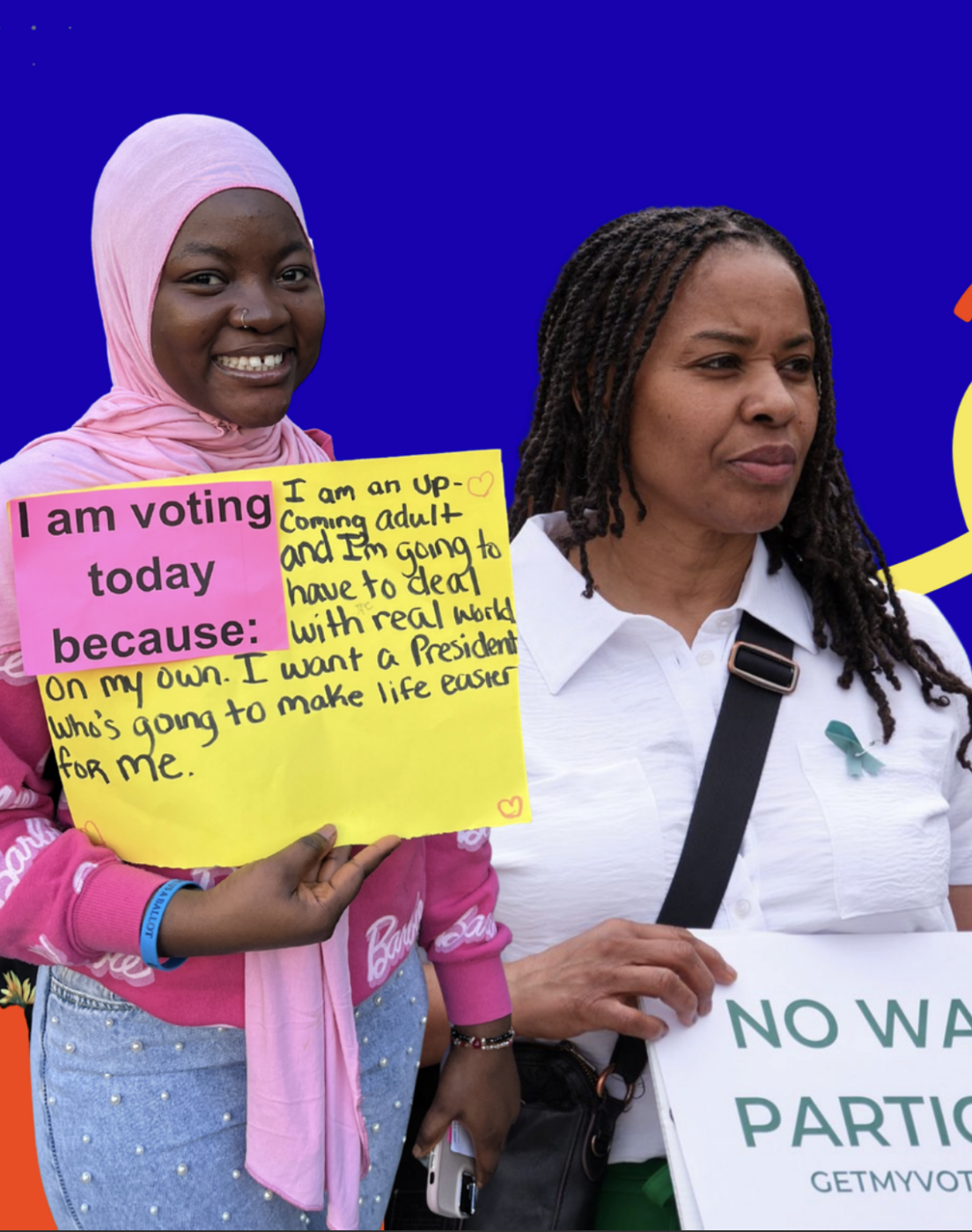 Women of color holding signs during a protest
